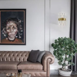Crown Wandleuchte Gold-Satiniert im eleganten Wohnzimmer mit edlem Interior und modernem Design