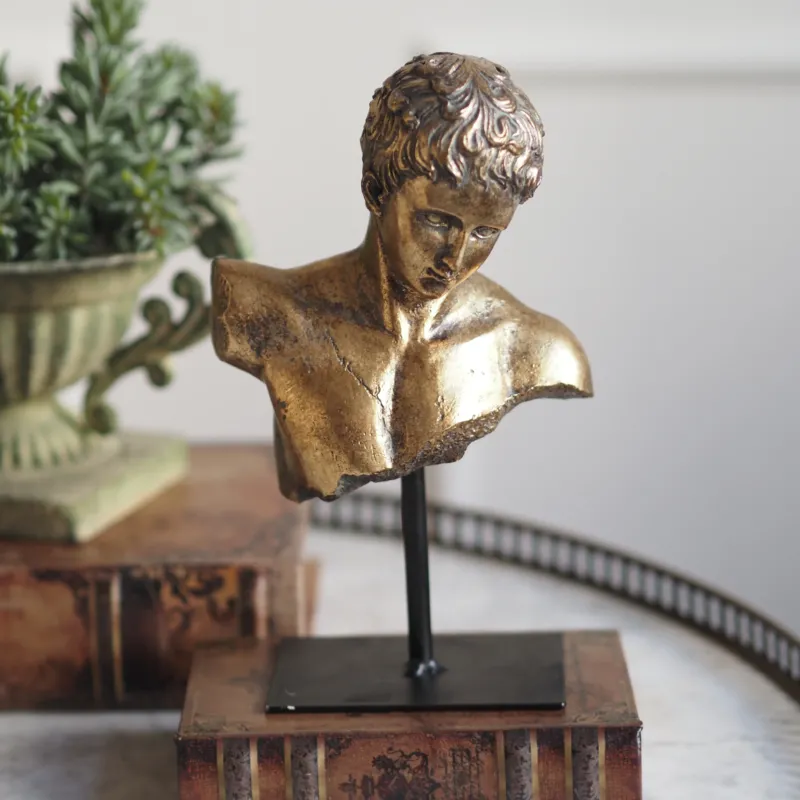 Kopfbüste Gold · klassische Skulptur auf Sockel