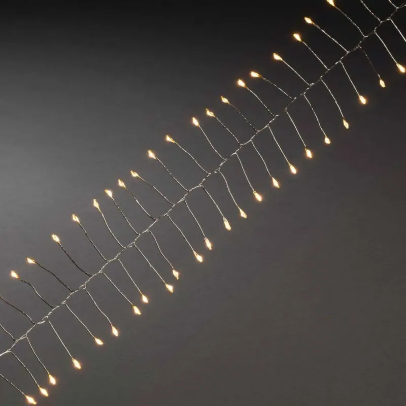 1,5m Micro LED Lichterkette Firecracker mit Timer 60 bernsteinfarbene Dioden batteriebetrieben Innen auf filigranem Draht.