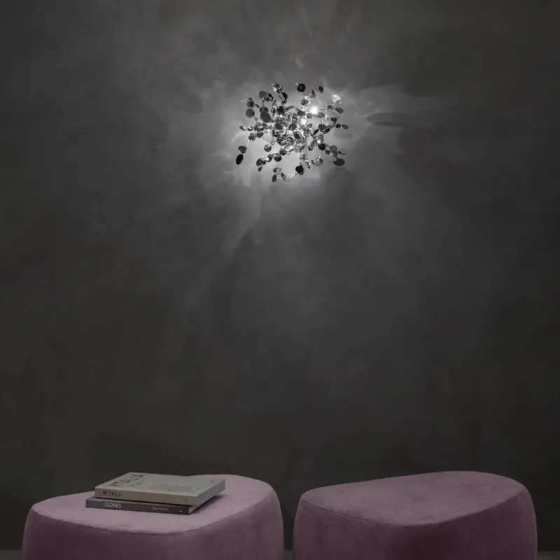 Terzani Argent Design-Wandlampe aus Metallscheiben, handgefertigt für schimmerndes Licht in modernem Interieur