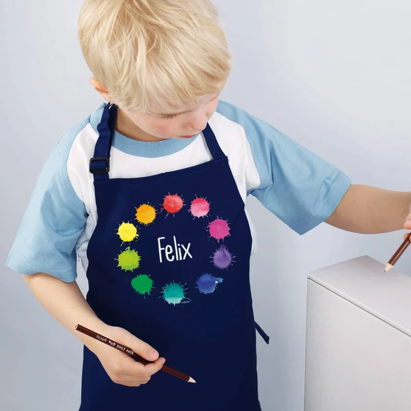 Kinderschürze mit Farbklecks-Motiv von Striefchen